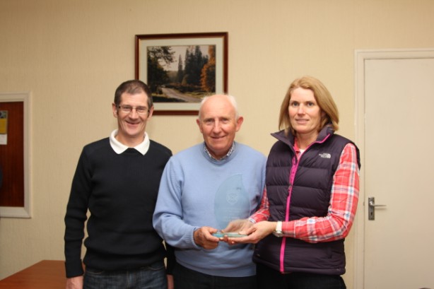 Leslie and Tara O'Donnell receive the Iverk Produce Carrick Wheelers Club person of the Year Award from Club Vice-President and Member of the Irish Olympic Council Billy Kennedy (Centre).
